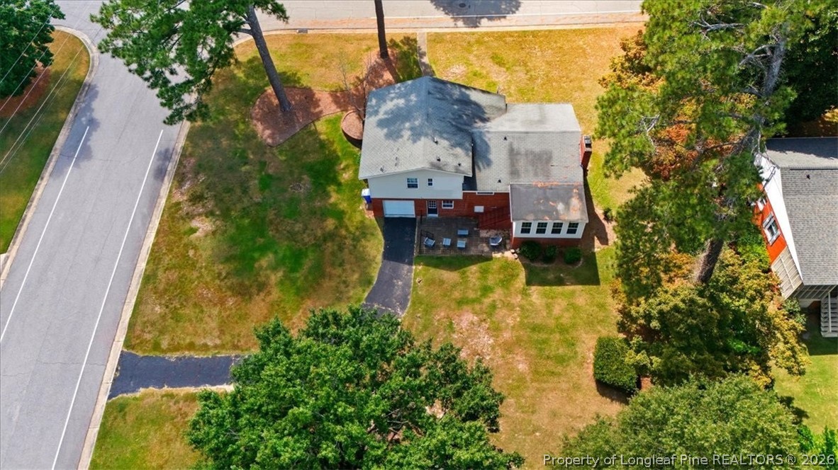 2604 Huntington Road Fayetteville, NC 28303 - Photo 44 of 46 an aerial view of a house with swimming pool and garden