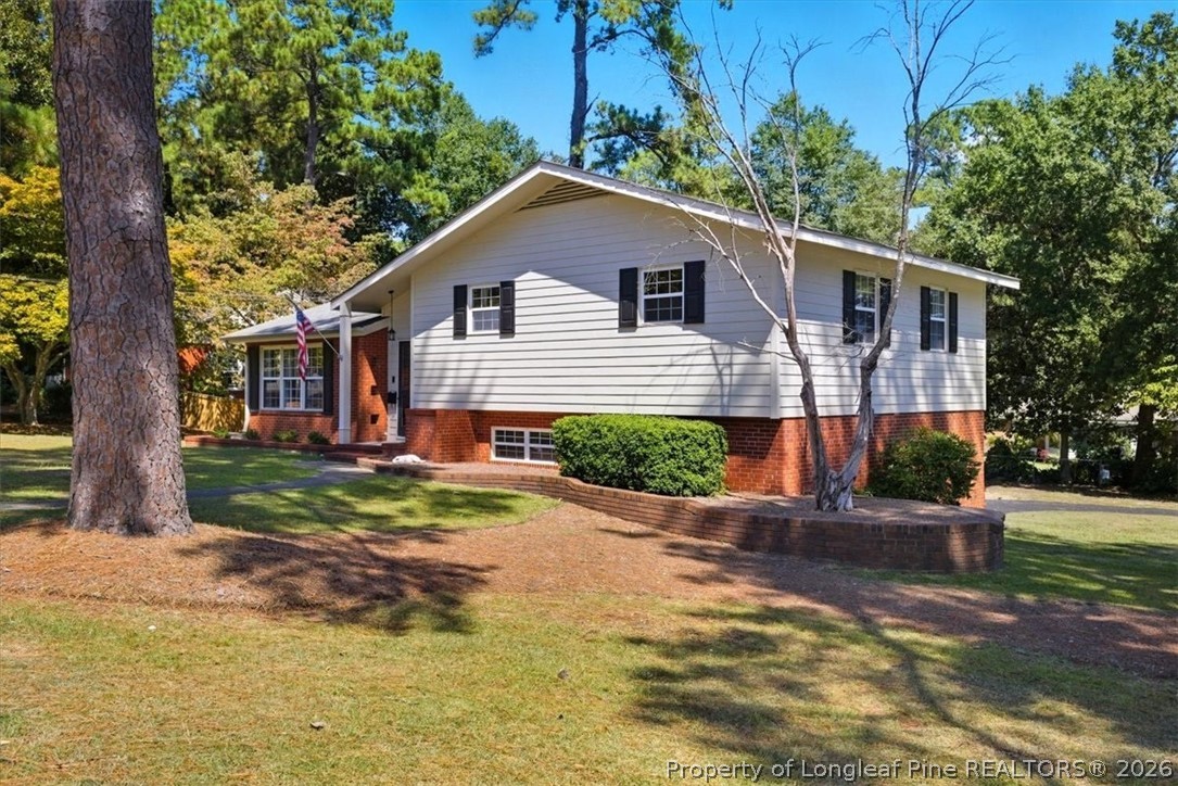 2604 Huntington Road Fayetteville, NC 28303 - Photo 45 of 46 a front view of a house with a yard