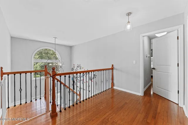 a view of entryway with wooden floor
