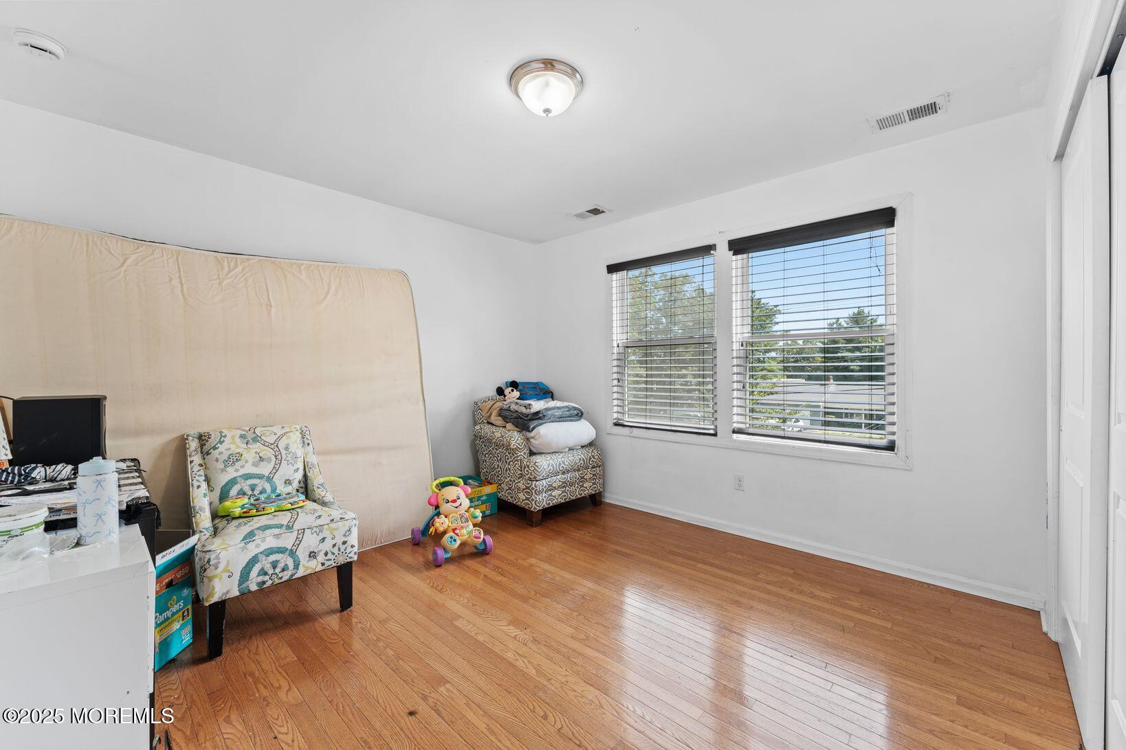 24 Friendship Road Howell, NJ 07731 - Photo 17 of 34 a bedroom with furniture and a window