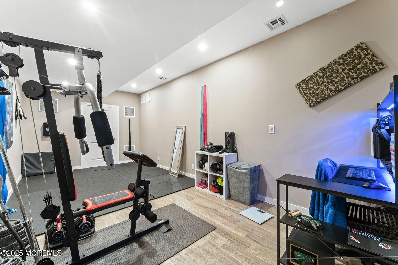 24 Friendship Road Howell, NJ 07731 - Photo 27 of 34 a view of a room with gym equipment