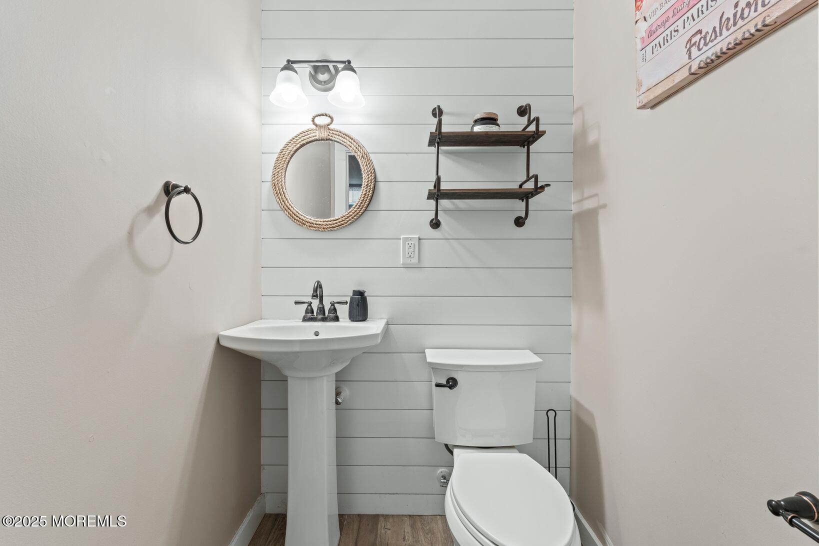 24 Friendship Road Howell, NJ 07731 - Photo 28 of 34 a bathroom with a toilet a sink and a mirror