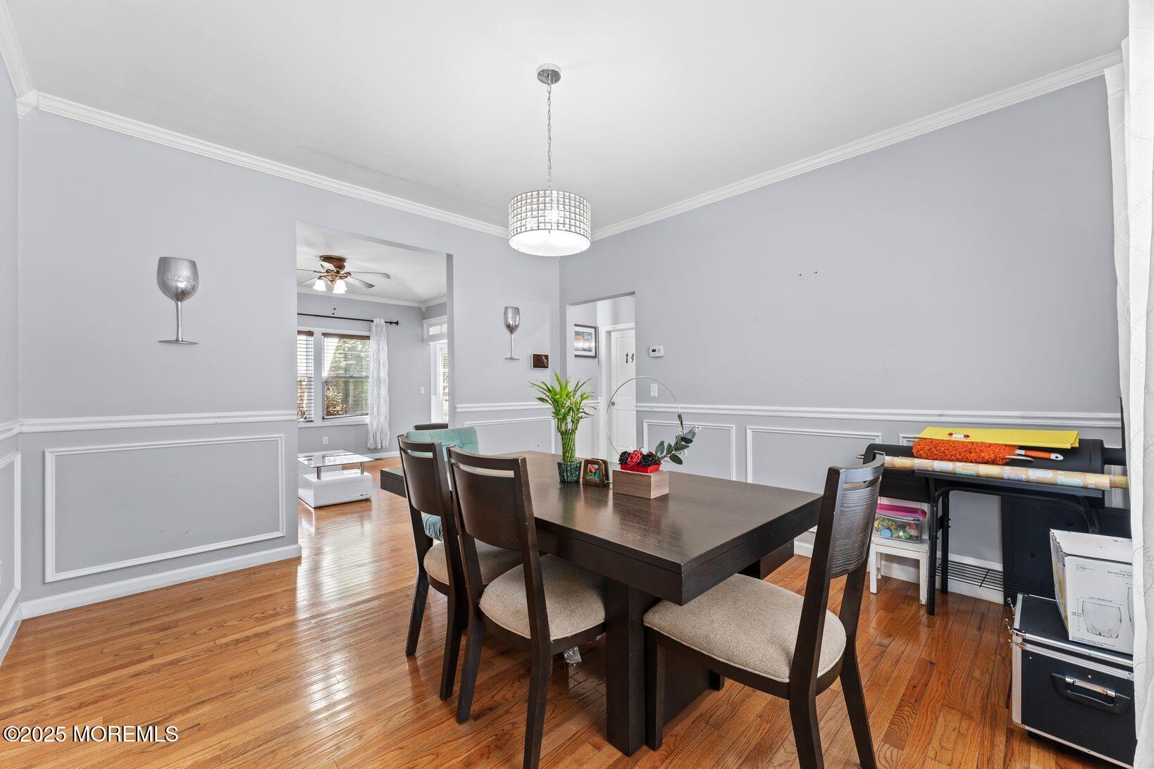 24 Friendship Road Howell, NJ 07731 - Photo 4 of 34 a view of a dining room with furniture and wooden floor