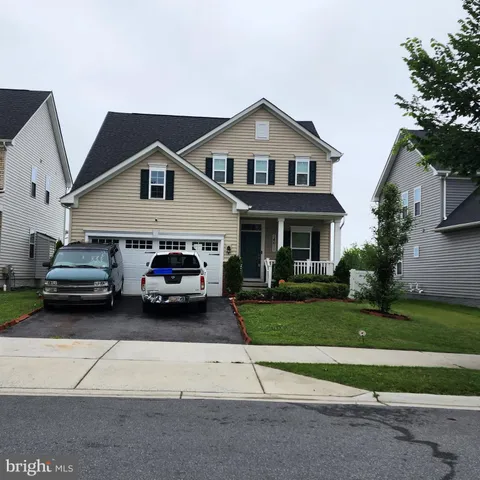 a car parked in front of a house