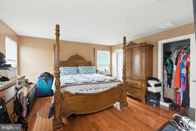 a bed room with a bed and a table