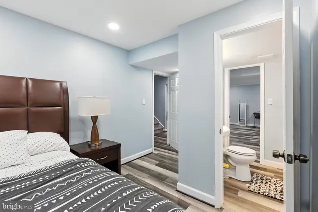 a bathroom with a shower and a mirror