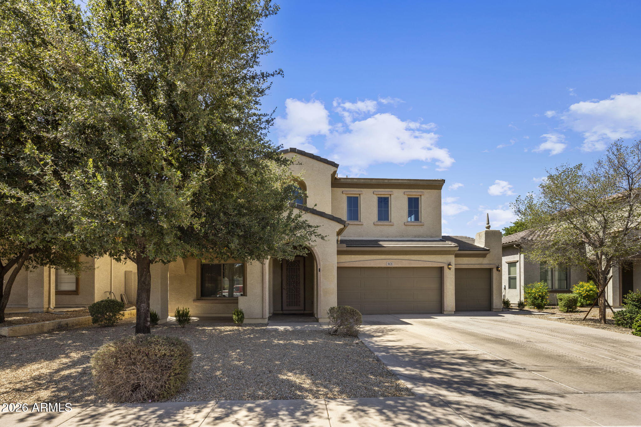 5121 West Beverly Road Laveen, AZ 85339 - Photo 3 of 32 a front view of a house with a yard