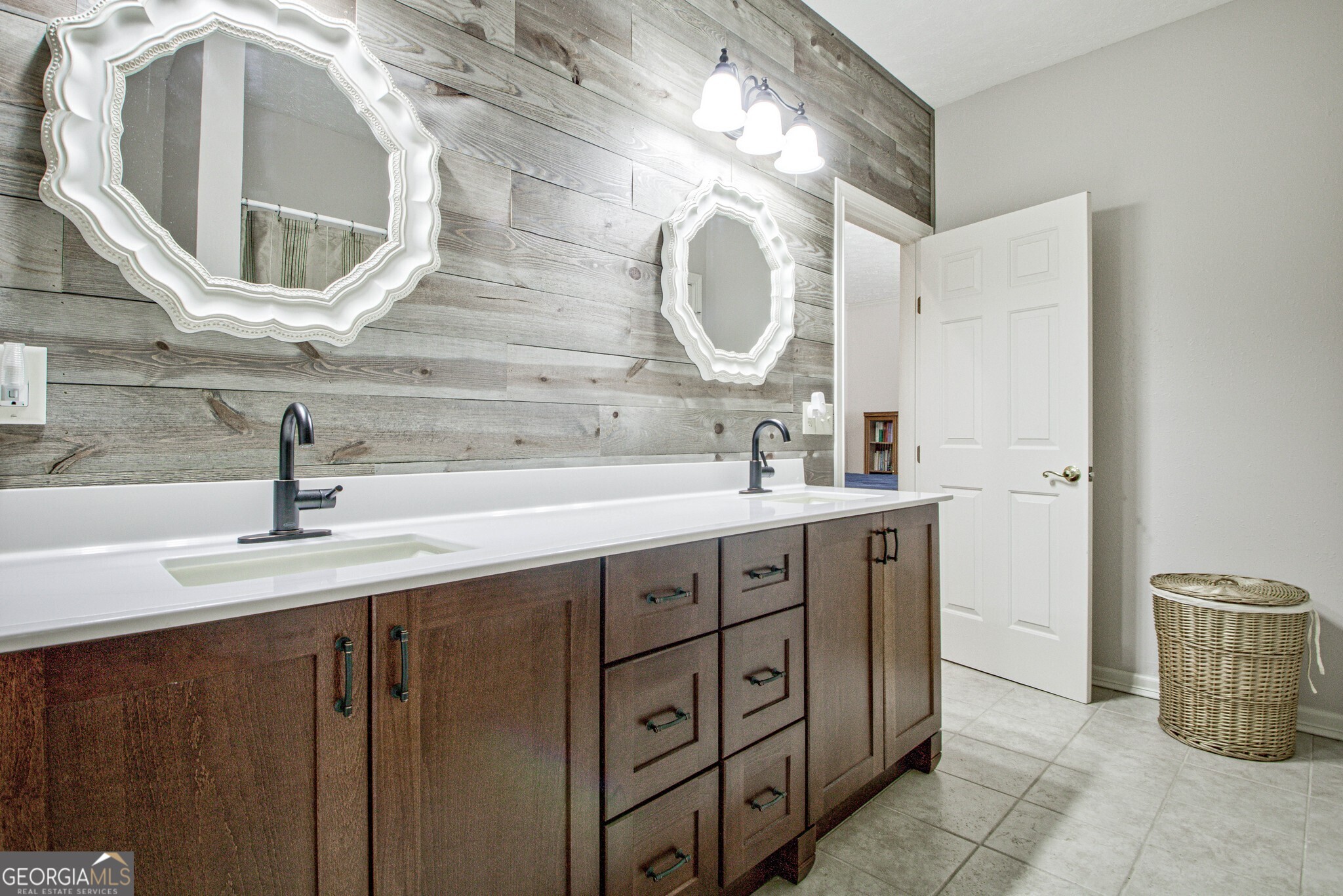 967 Tope Road Sharpsburg, GA 30277 - Photo 11 of 98 a bathroom with a double vanity sink and a mirror