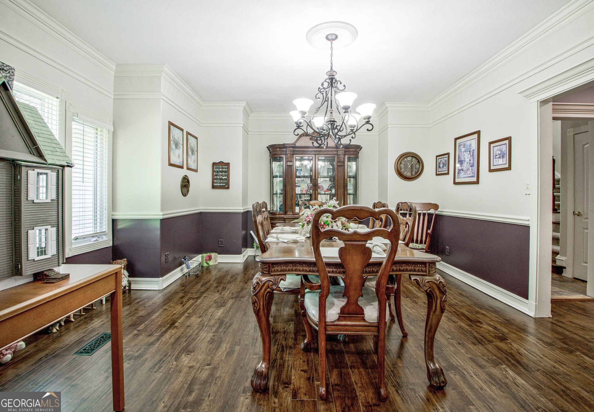 967 Tope Road Sharpsburg, GA 30277 - Photo 13 of 98 a view of a dining room with furniture and chandelier