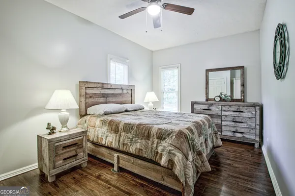 a kitchen with stainless steel appliances granite countertop a refrigerator sink and cabinets