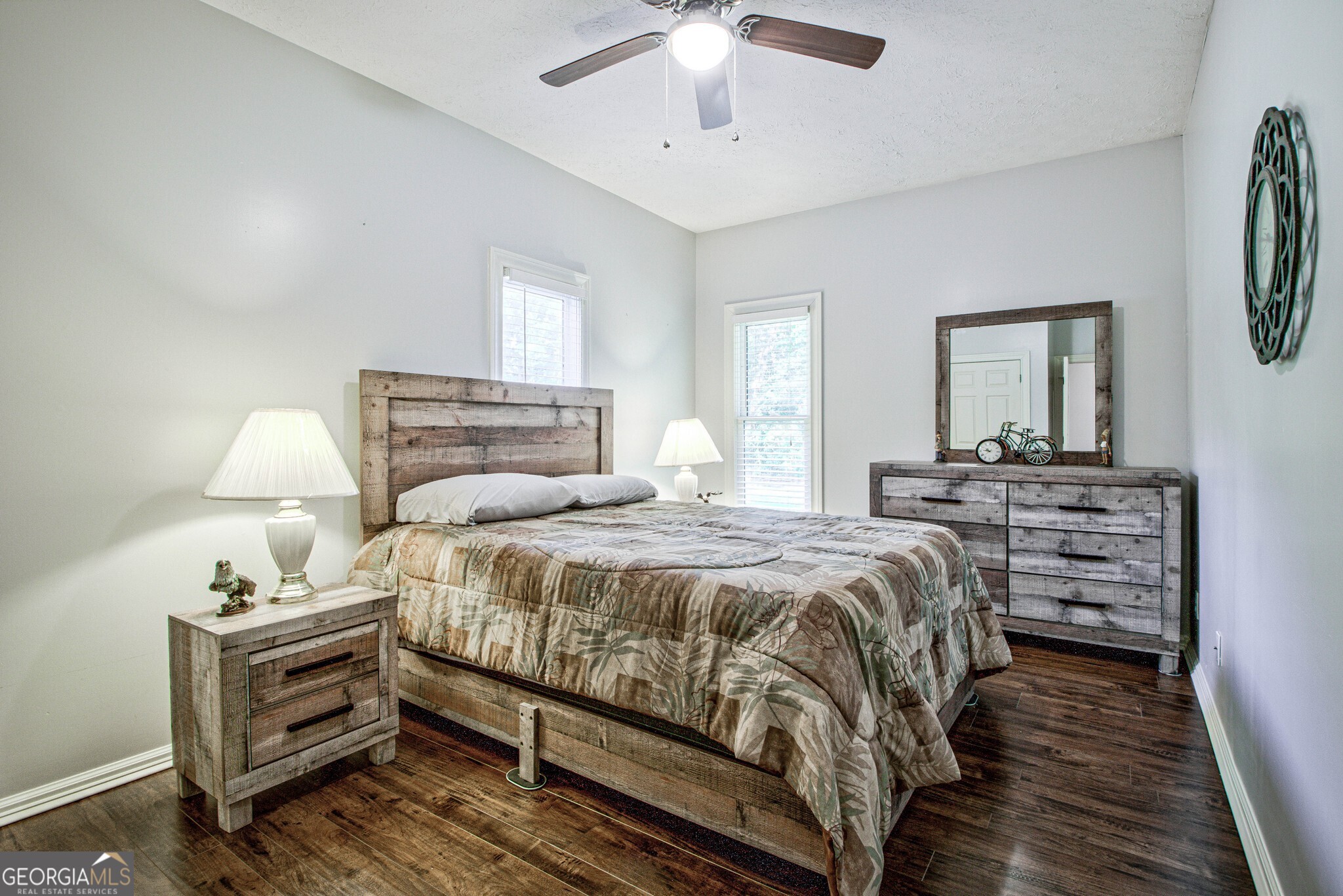 967 Tope Road Sharpsburg, GA 30277 - Photo 18 of 98 a bedroom with bed and window