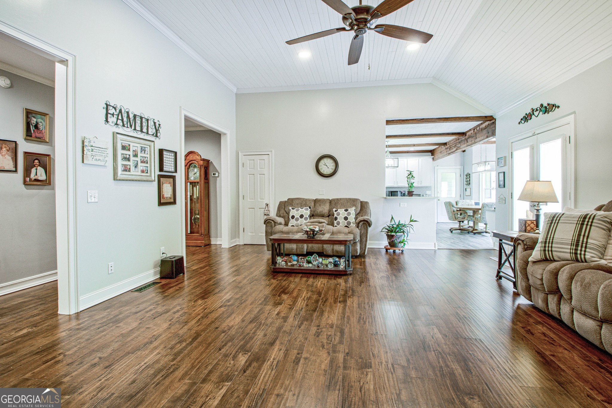967 Tope Road Sharpsburg, GA 30277 - Photo 21 of 98 a living room with furniture and wooden floor
