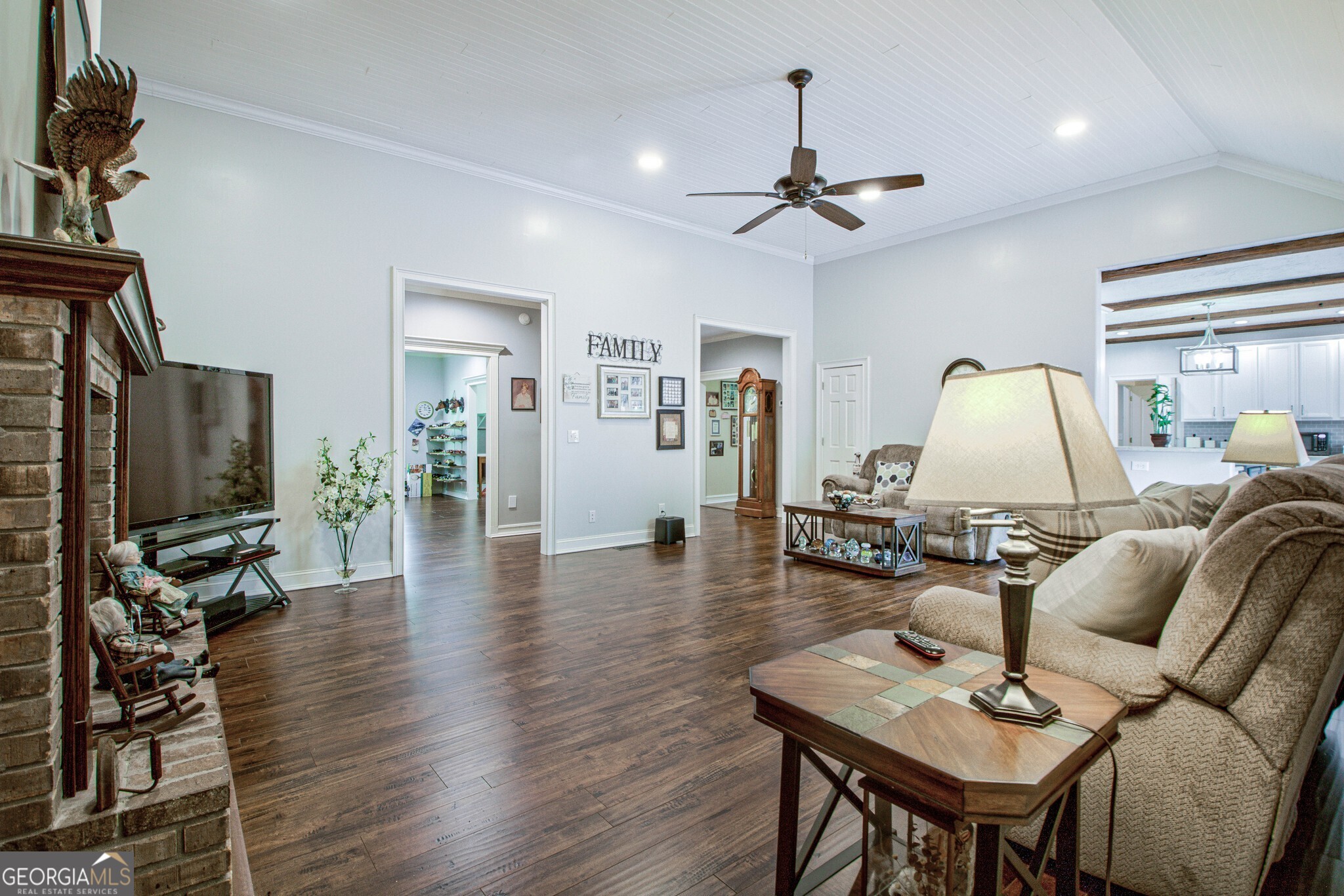 967 Tope Road Sharpsburg, GA 30277 - Photo 22 of 98 a living room with furniture and a flat screen tv