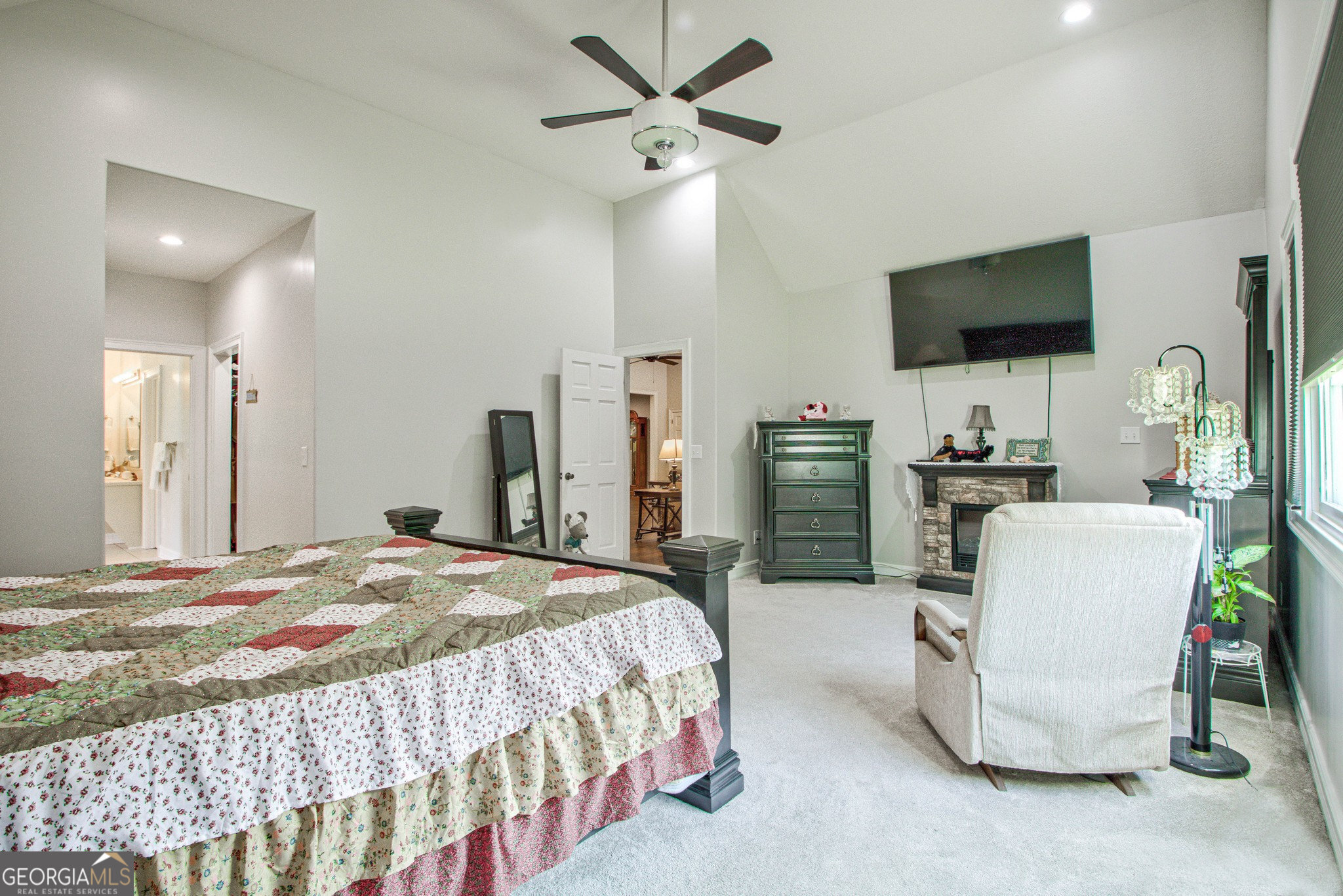 967 Tope Road Sharpsburg, GA 30277 - Photo 25 of 98 a bedroom with a bed and flat screen tv