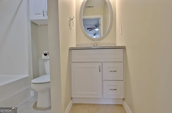 a view of house with outdoor space