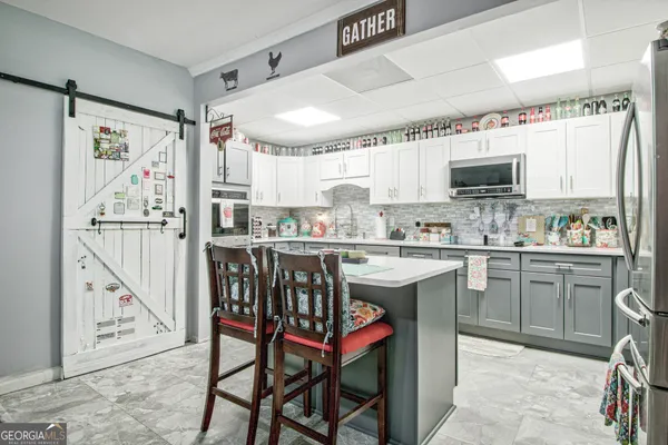 $890,000 | 967 Tope Road, Sharpsburg, GA 30277