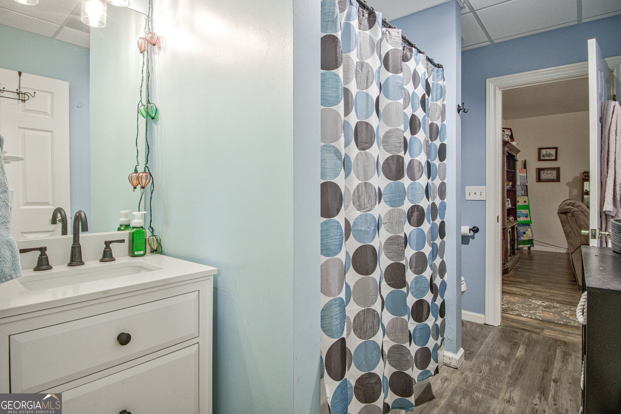 967 Tope Road Sharpsburg, GA 30277 - Photo 60 of 98 a bathroom with a sink and a mirror