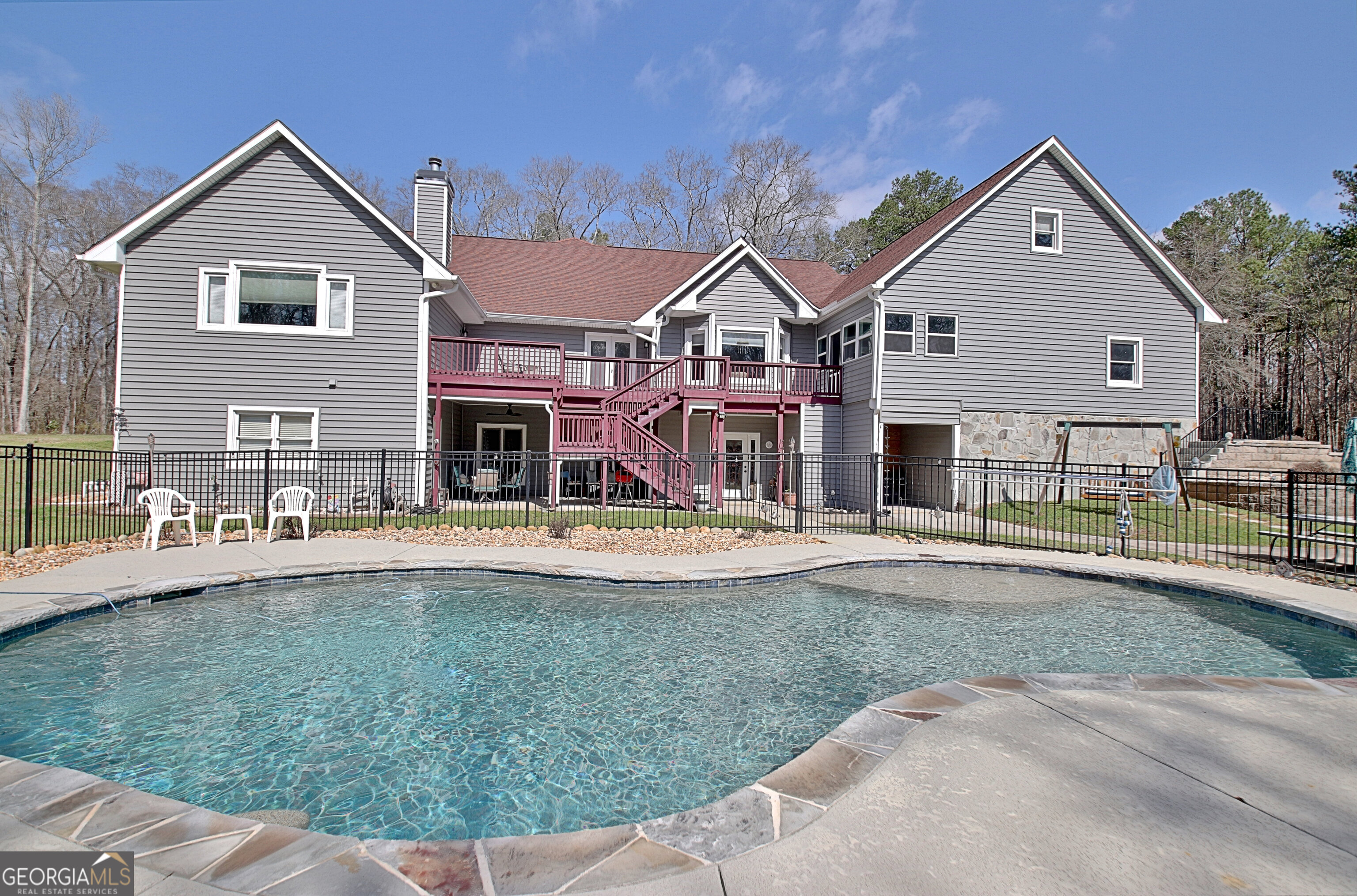967 Tope Road Sharpsburg, GA 30277 - Photo 64 of 98 a front view of house with yard and seating area