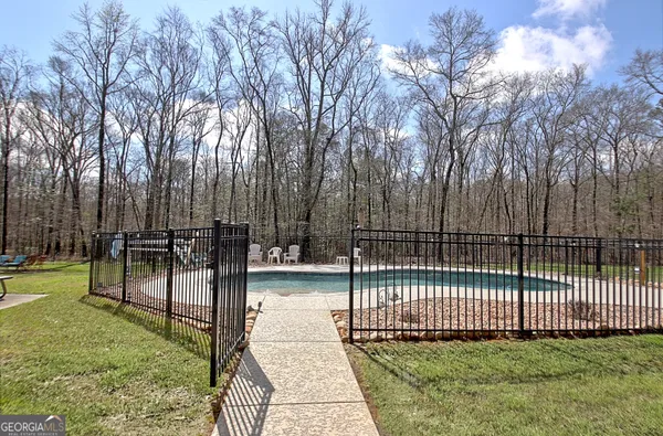 $890,000 | 967 Tope Road, Sharpsburg, GA 30277