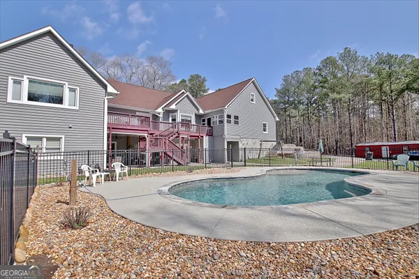 $890,000 | 967 Tope Road, Sharpsburg, GA 30277