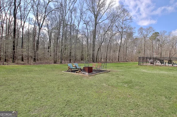 $890,000 | 967 Tope Road, Sharpsburg, GA 30277