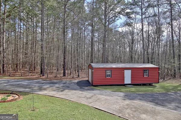 $890,000 | 967 Tope Road, Sharpsburg, GA 30277