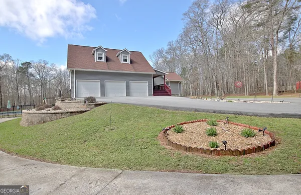 $890,000 | 967 Tope Road, Sharpsburg, GA 30277