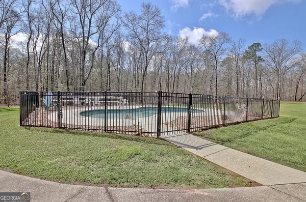 $890,000 | 967 Tope Road, Sharpsburg, GA 30277