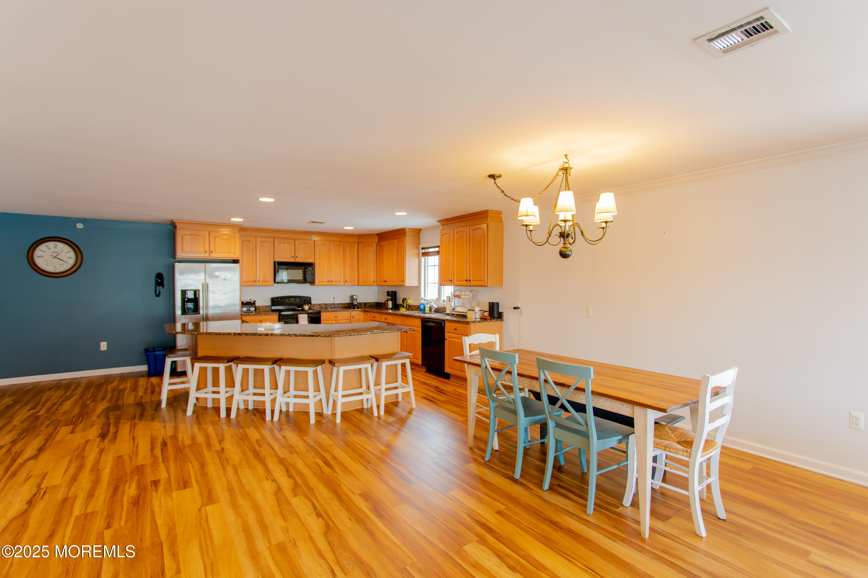 580 East Main Street, Unit 3 Manasquan, NJ 08736 - Photo 11 of 41 a living room with dining room and wooden floor