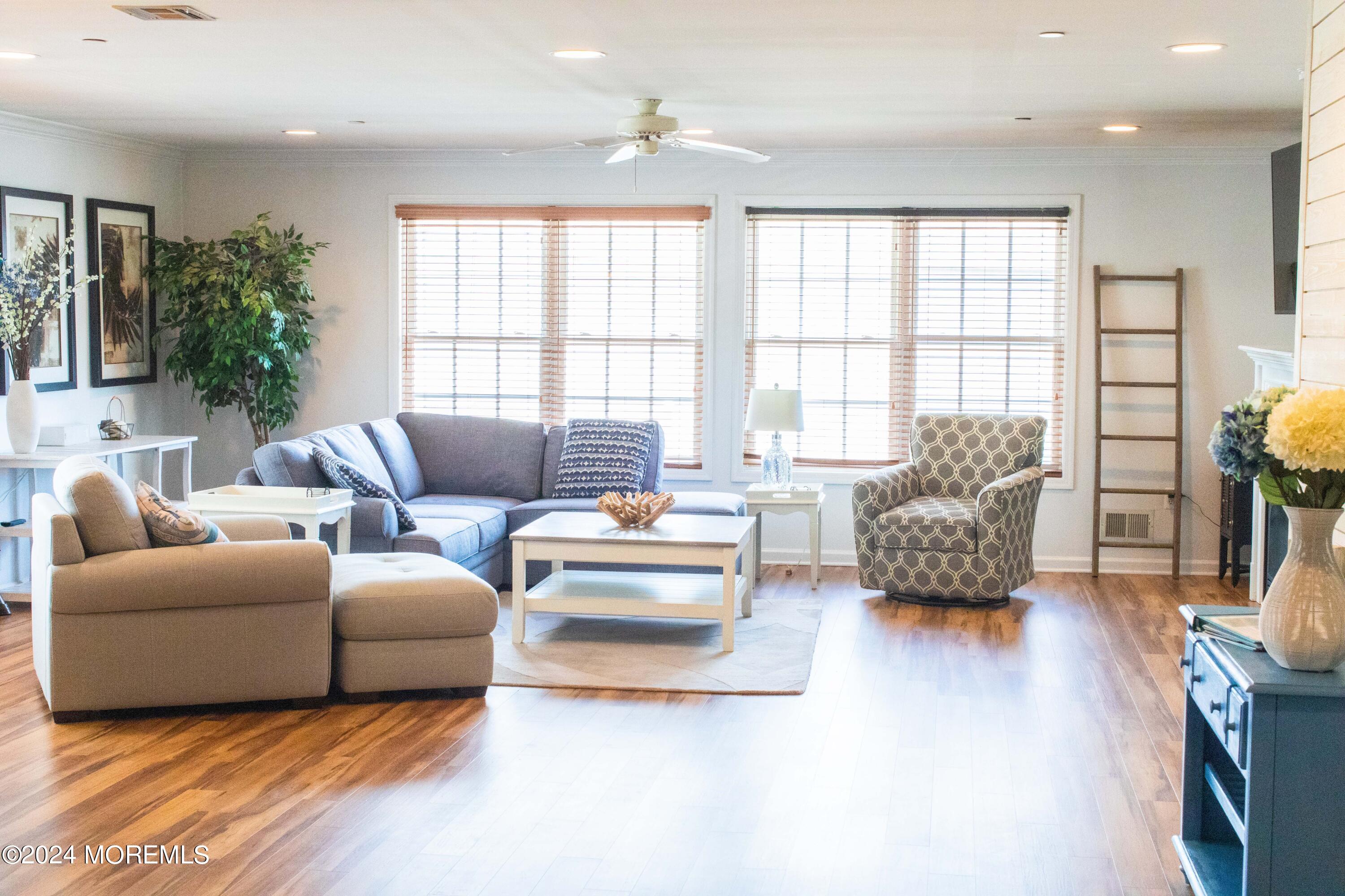 580 East Main Street, Unit 3 Manasquan, NJ 08736 - Photo 18 of 41 a living room with furniture and a large window