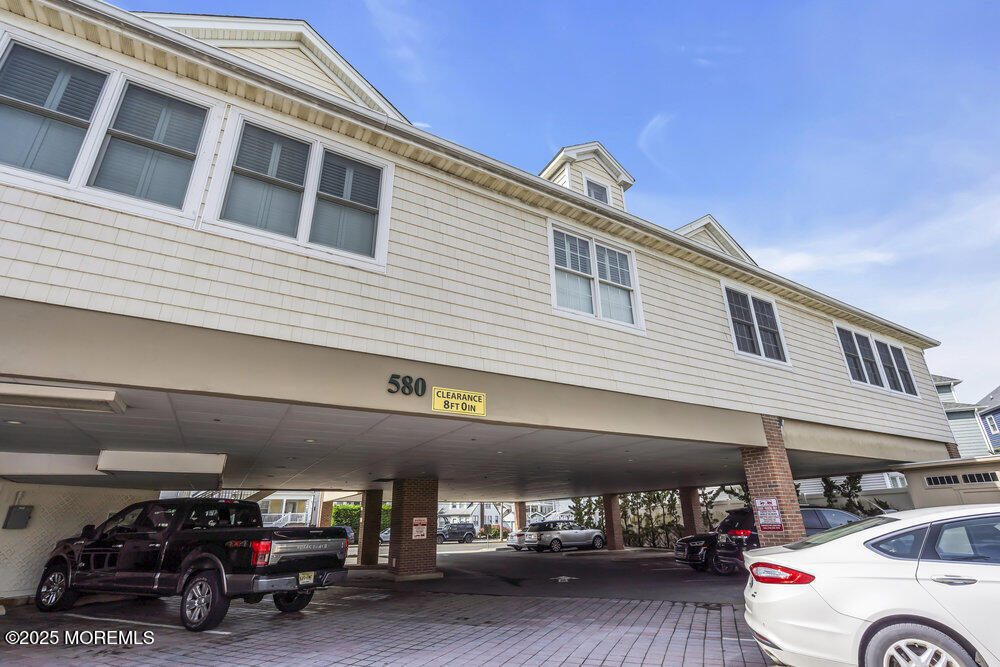 580 East Main Street, Unit 3 Manasquan, NJ 08736 - Photo 20 of 41 a car parked in front of a building