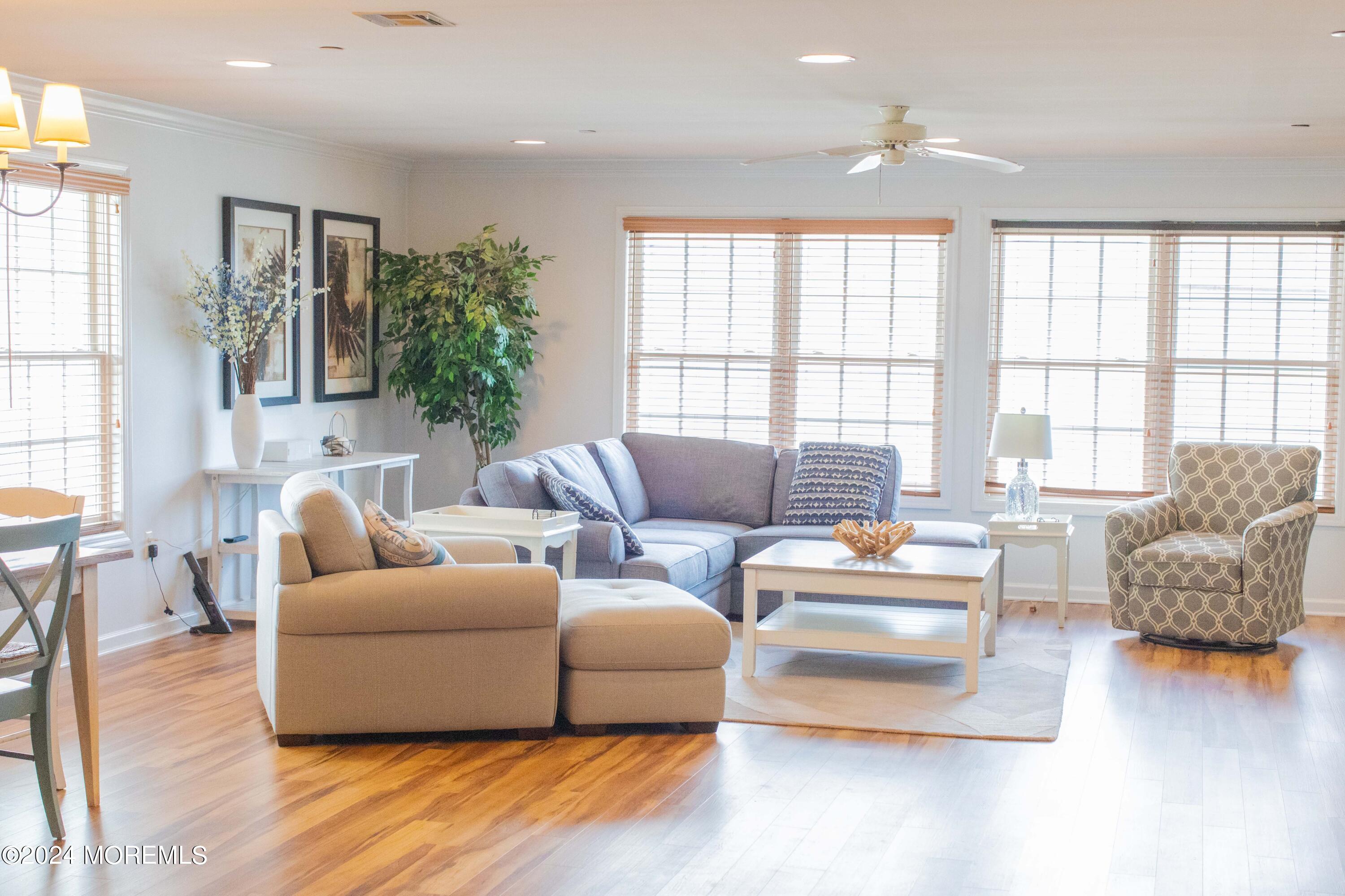 580 East Main Street, Unit 3 Manasquan, NJ 08736 - Photo 22 of 41 a living room with furniture and a large window