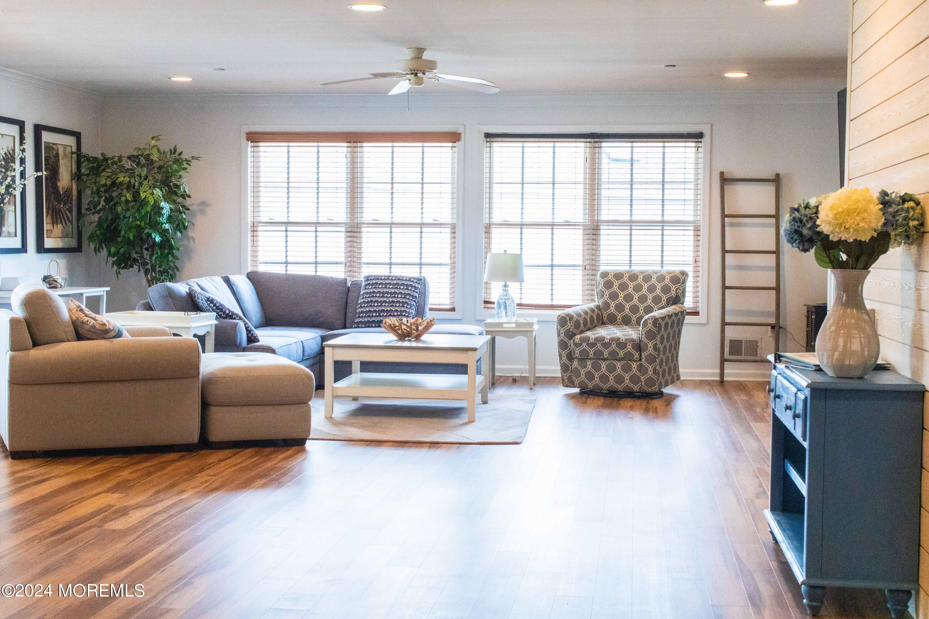 580 East Main Street, Unit 3 Manasquan, NJ 08736 - Photo 23 of 41 a living room with furniture and a large window