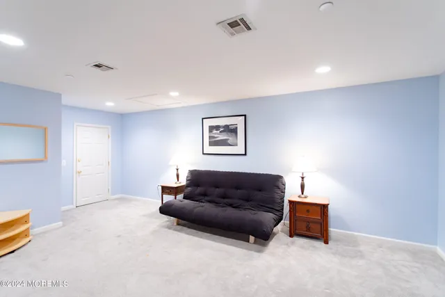 a living room with furniture and a couch