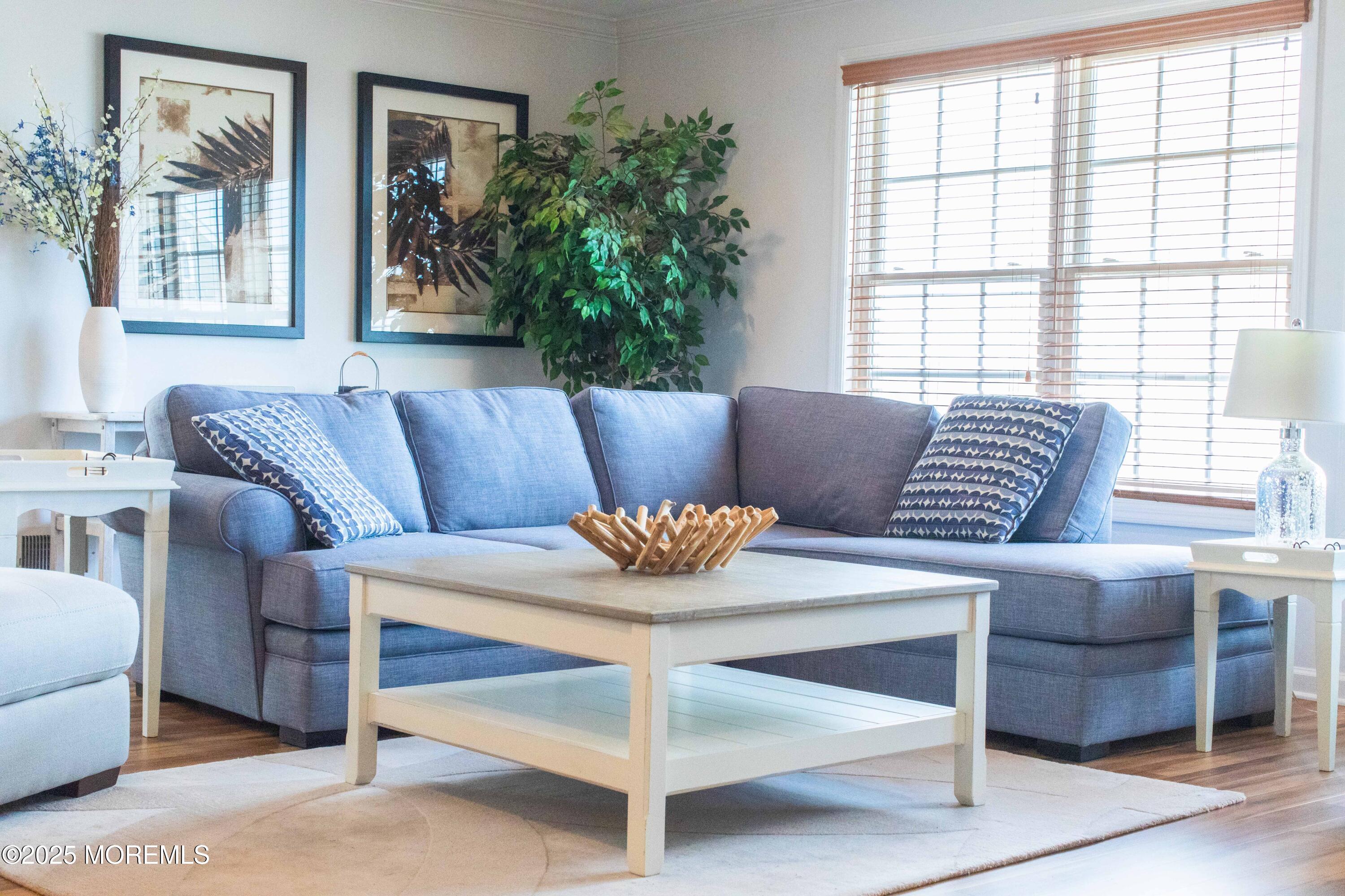 580 East Main Street, Unit 3 Manasquan, NJ 08736 - Photo 41 of 41 a living room with furniture and a potted plant