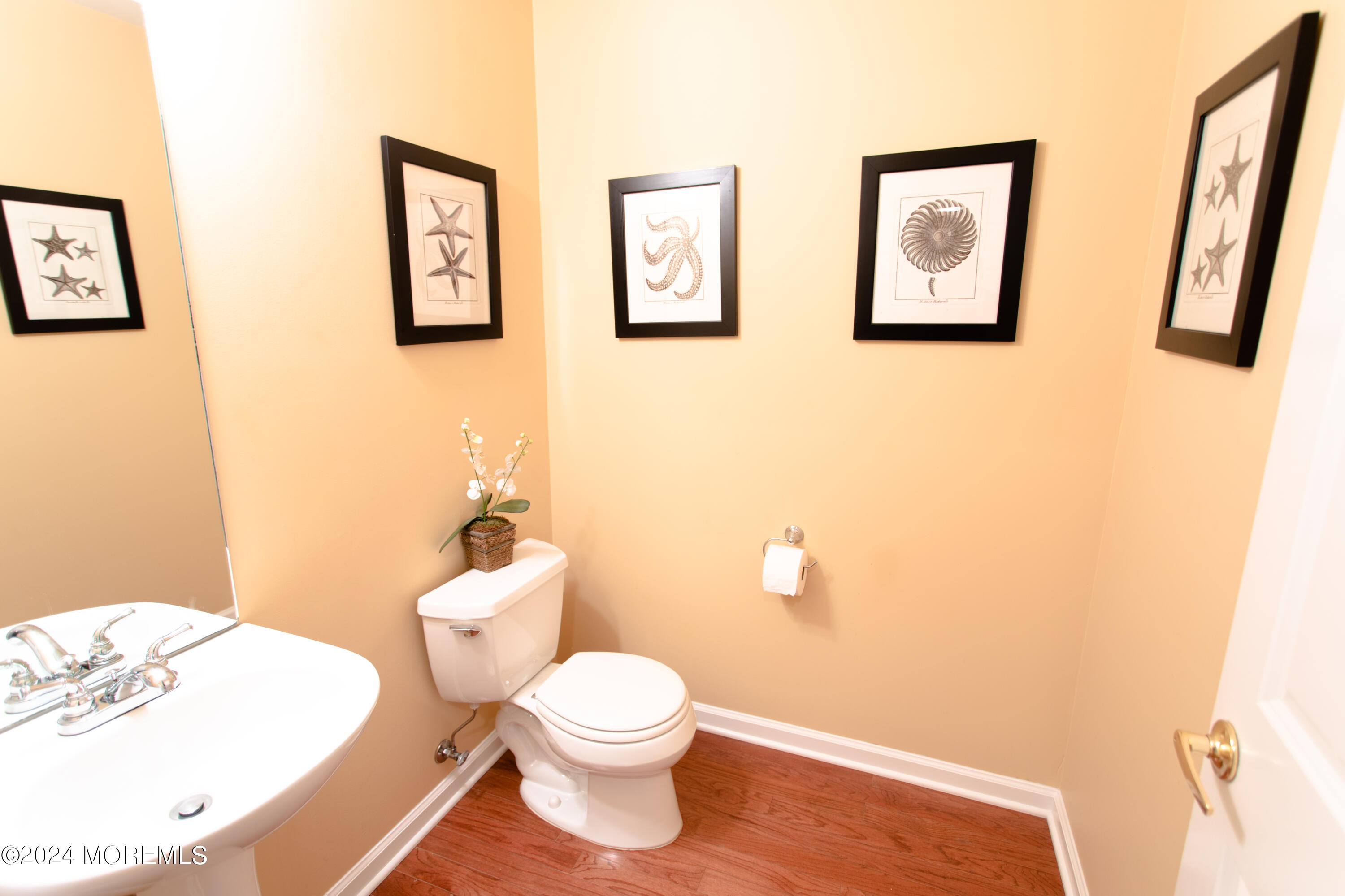 580 East Main Street, Unit 3 Manasquan, NJ 08736 - Photo 7 of 41 a bathroom with a toilet and a sink