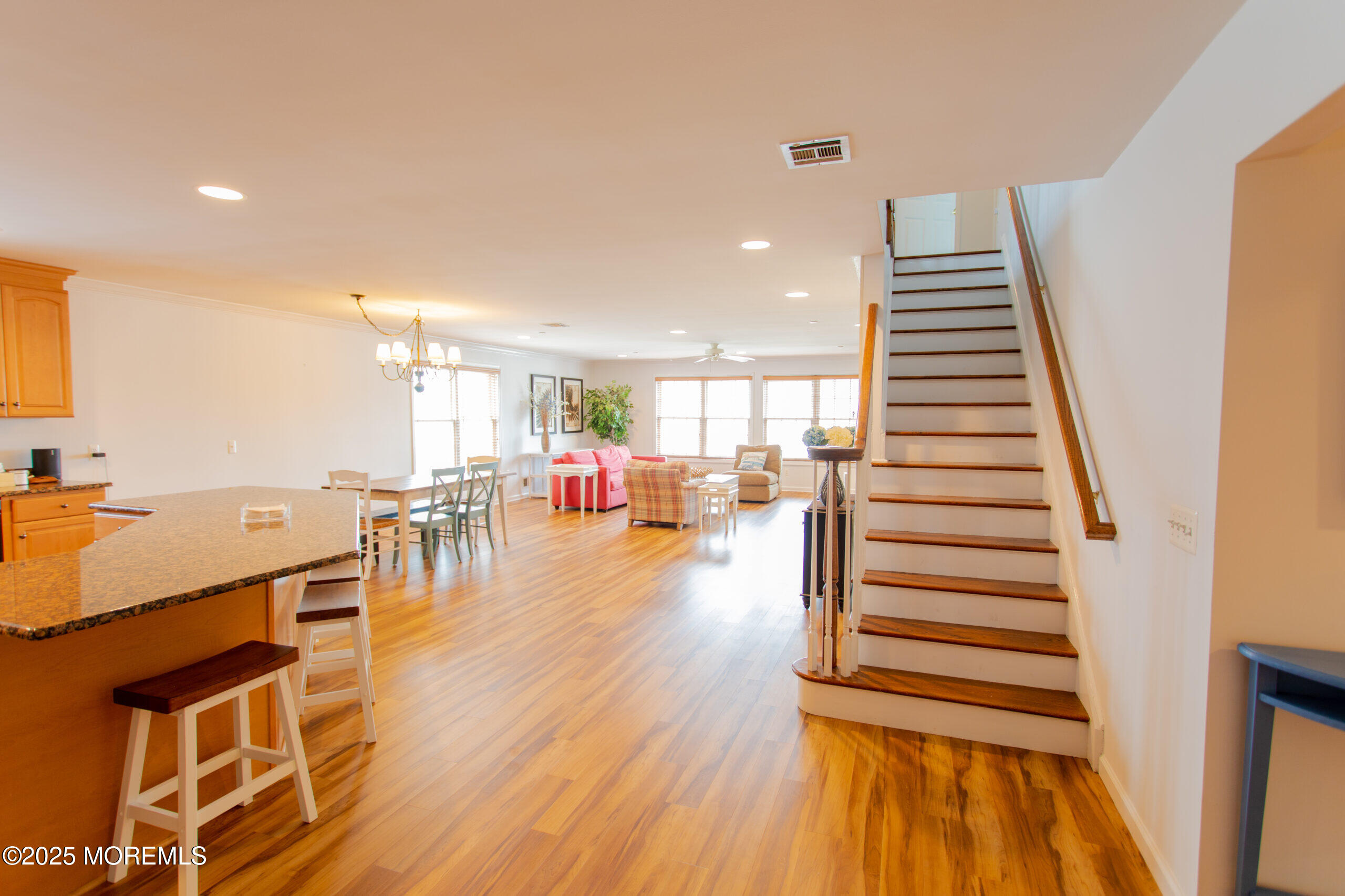 580 East Main Street, Unit 3 Manasquan, NJ 08736 - Photo 10 of 41 a room with lots of wooden furniture and a view of living room
