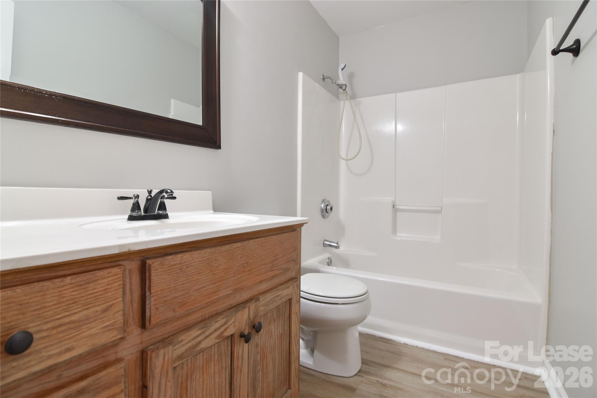 110 Pratt Street Belmont, NC 28012 - Photo 14 of 18 a bathroom with a sink toilet and shower