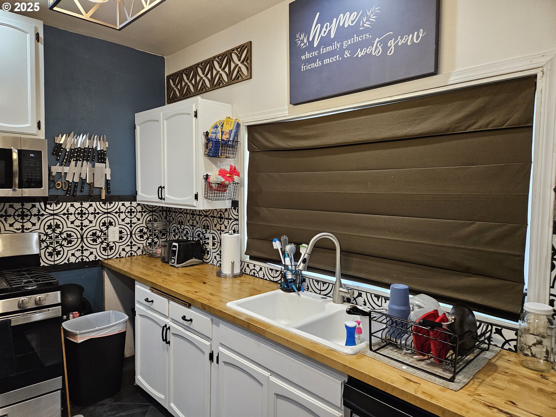1040 Southeast 6th Avenue Albany, OR 97321 - Photo 15 of 48 a kitchen with a sink and cabinets