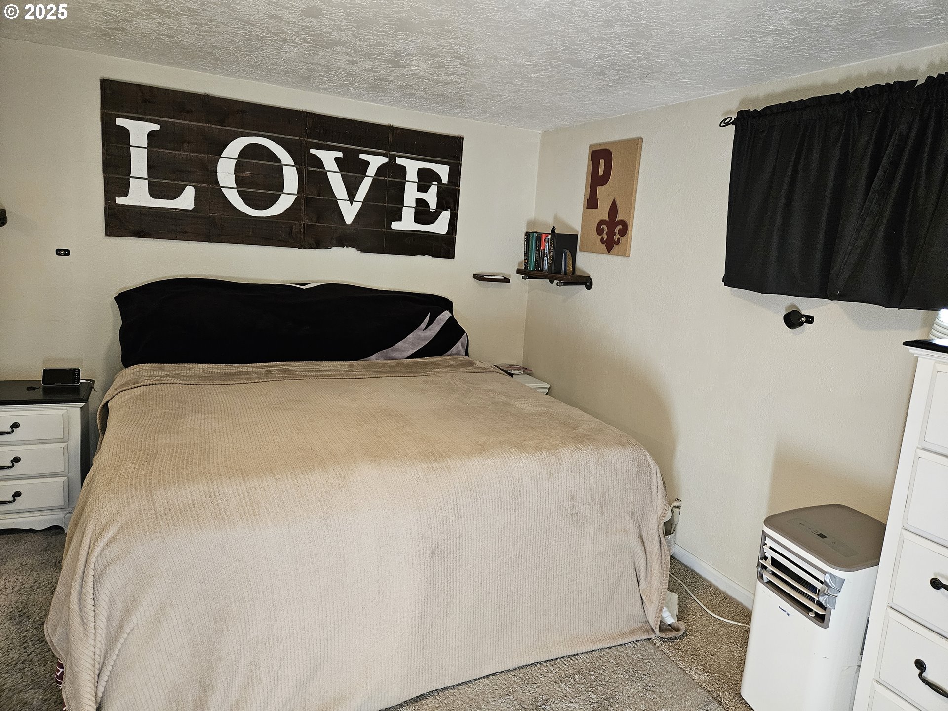 1040 Southeast 6th Avenue Albany, OR 97321 - Photo 19 of 48 a bedroom with a bed and furniture
