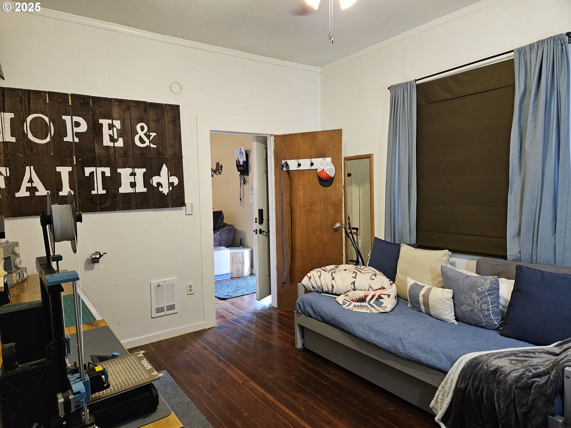 1040 Southeast 6th Avenue Albany, OR 97321 - Photo 30 of 48 a living room with furniture and wooden floor