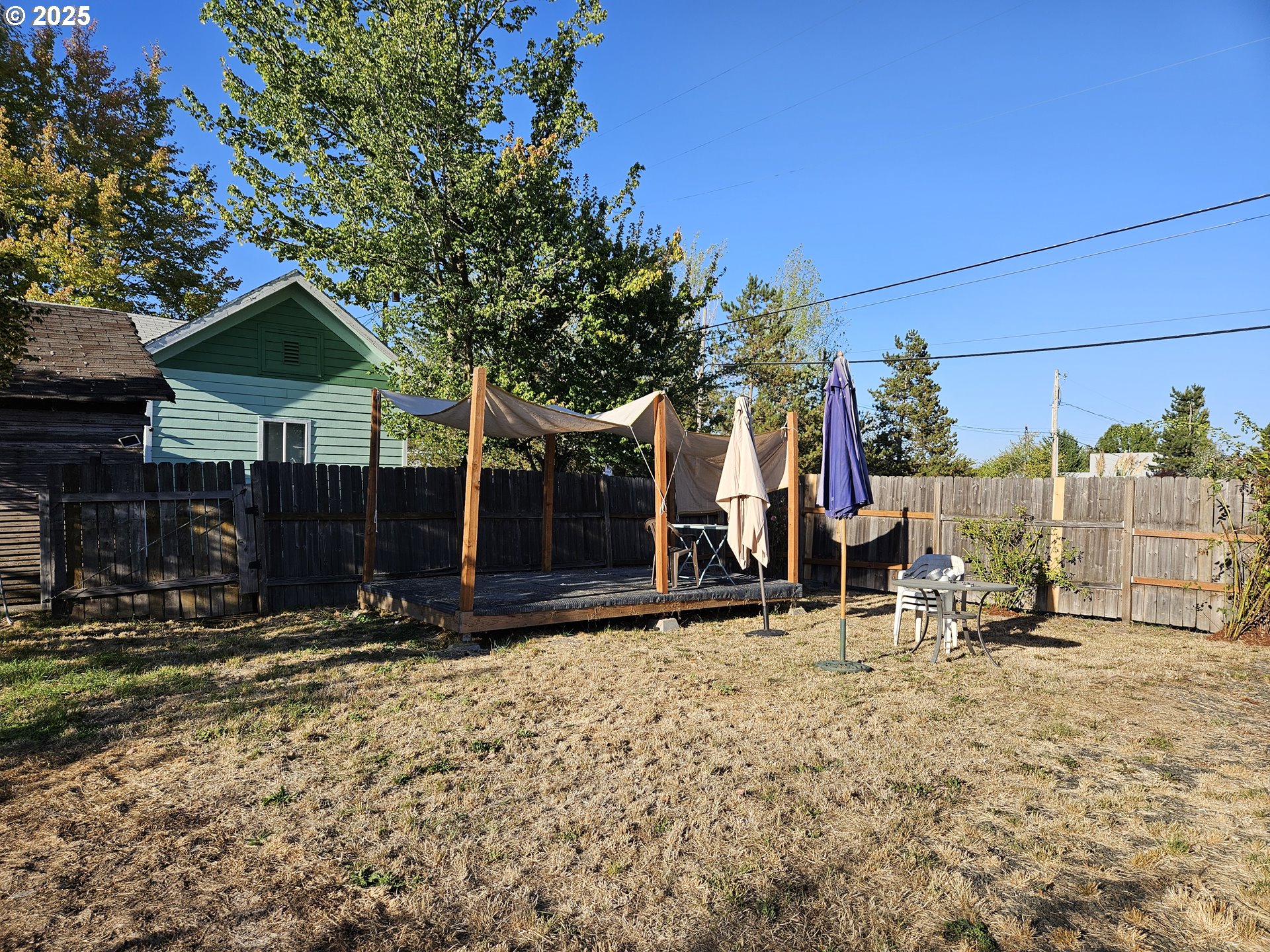 1040 Southeast 6th Avenue Albany, OR 97321 - Photo 40 of 48 a view of outdoor space with seating area and trees
