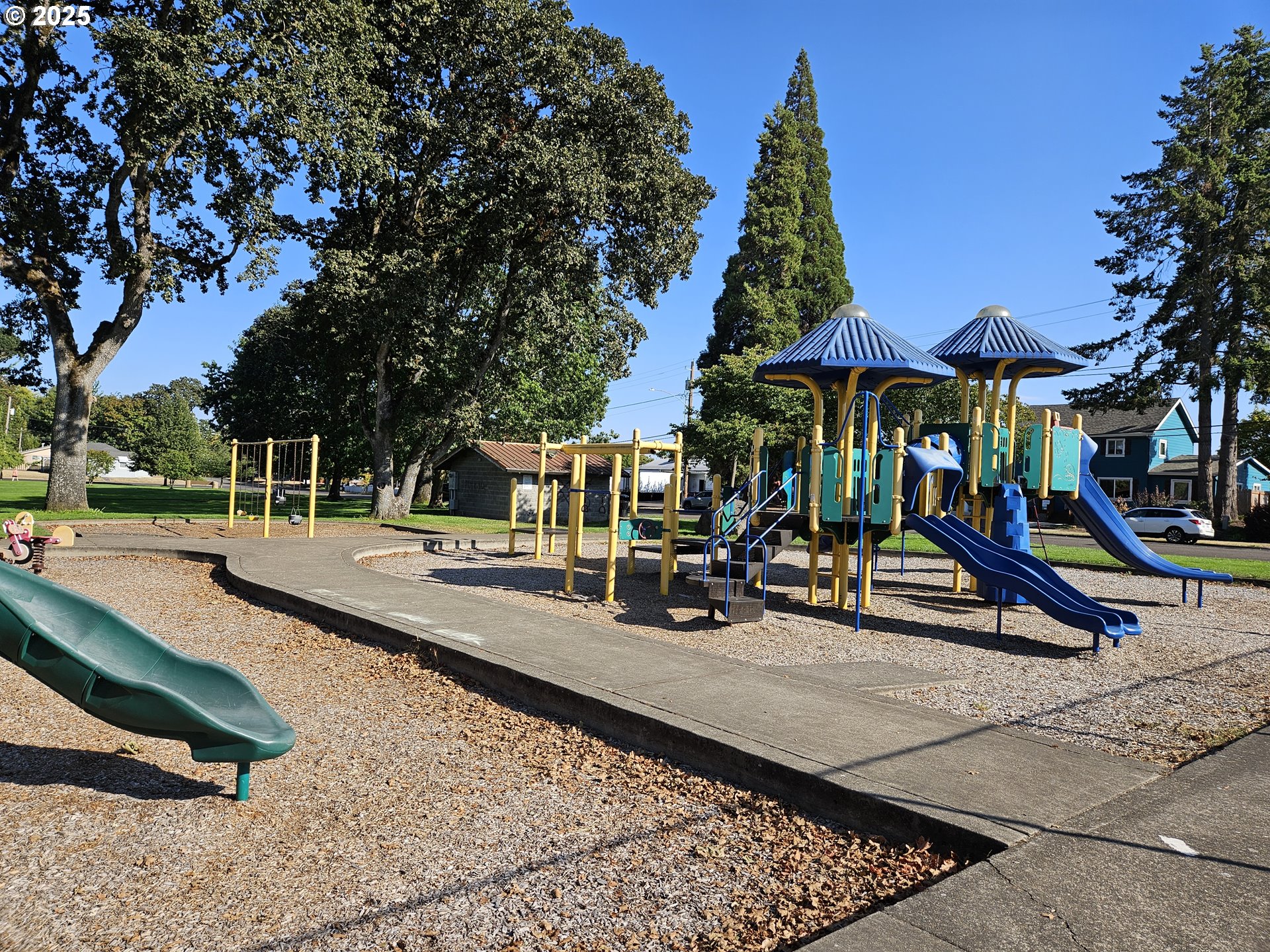 1040 Southeast 6th Avenue Albany, OR 97321 - Photo 46 of 48 a view of a park with swings and slides