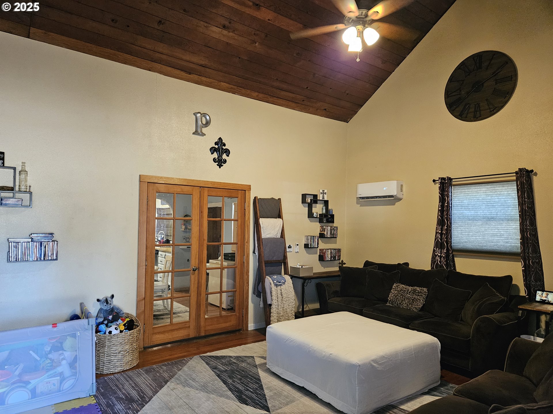 1040 Southeast 6th Avenue Albany, OR 97321 - Photo 5 of 48 a living room with furniture and a chandelier