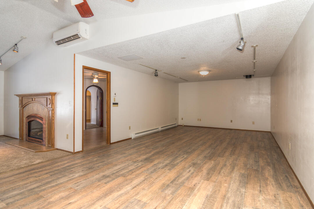 19166 Kiowa Road Bend, OR 97702 - Photo 5 of 34 a view of a livingroom with a fireplace