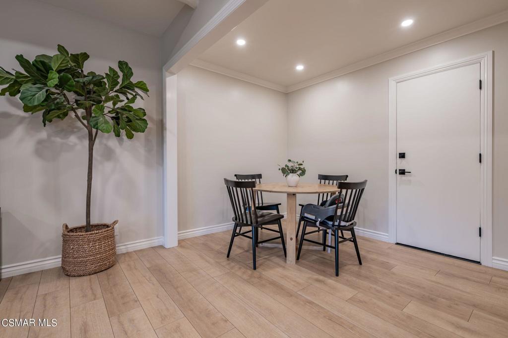 75 Neish Street Camarillo, CA 93010 - Photo 16 of 42 a view of a dining room with furniture and a potted plant