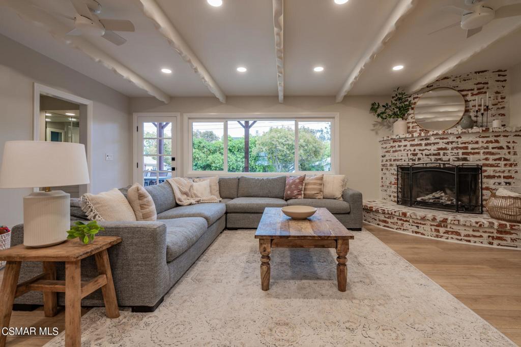 75 Neish Street Camarillo, CA 93010 - Photo 19 of 42 a living room with furniture and a fireplace