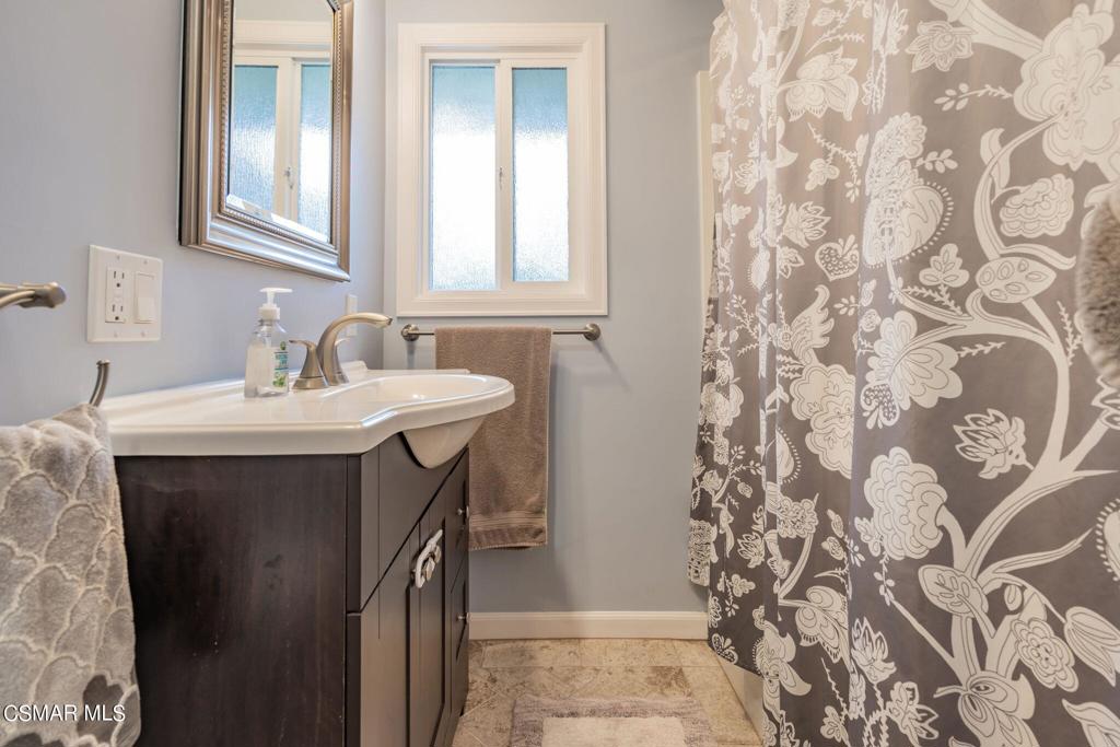 75 Neish Street Camarillo, CA 93010 - Photo 33 of 42 a bathroom with a sink and a mirror