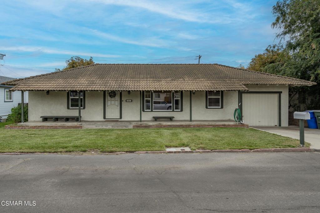 75 Neish Street Camarillo, CA 93010 - Photo 37 of 42 a front view of a house with a garden