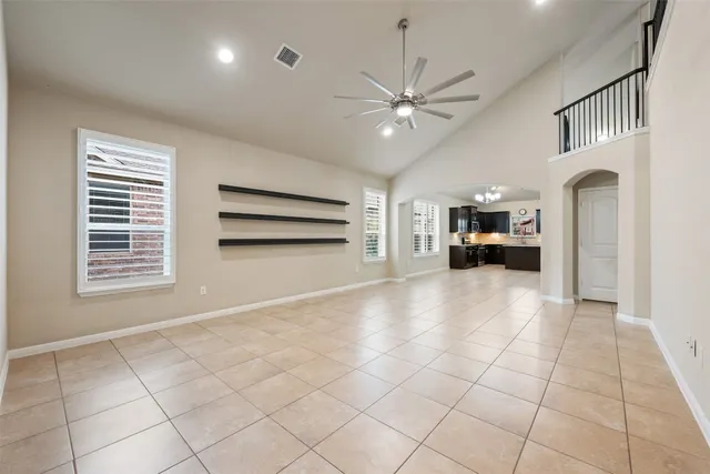 a view of livingroom with furniture and chandelier fan